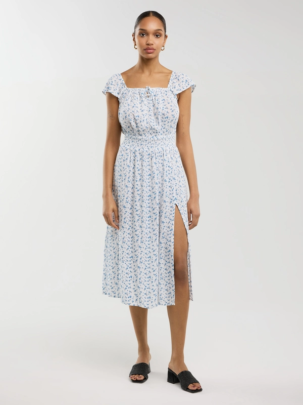 Sukienka damska midi z wiskozy z motywem kwiatowym biała Lopa 100