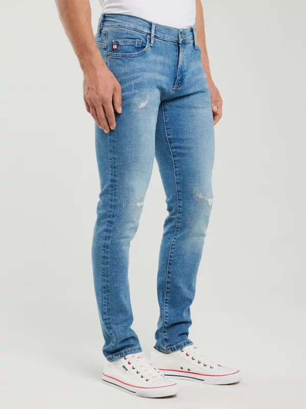 Jeansy męskie skinny z przetarciami niebieskie Jeffray 298