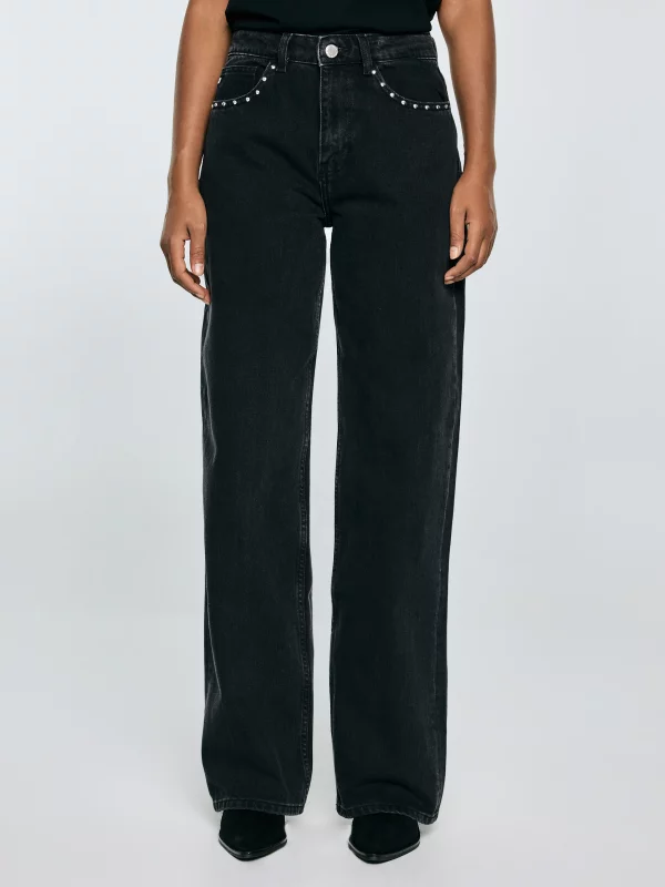Jeansy damskie z szeroką nogawką z ozdobnymi dżetami czarne Atrea 929