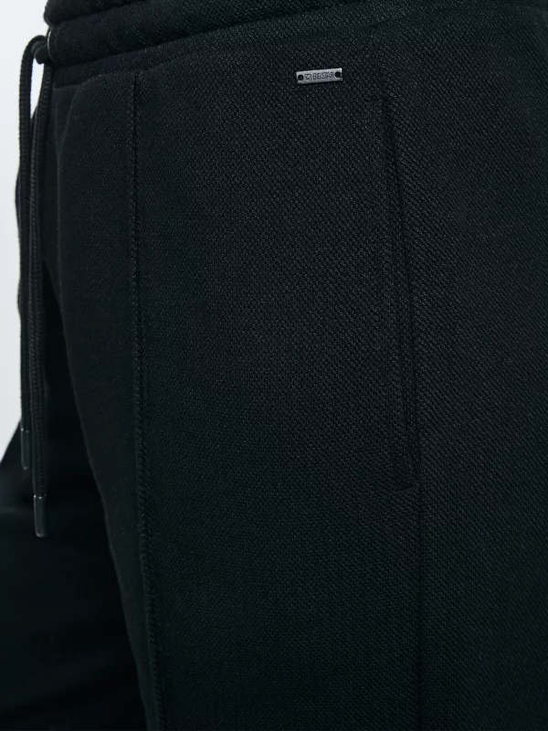 Spodnie damskie dresowe z przeszyciem czarne Pixelinap 906