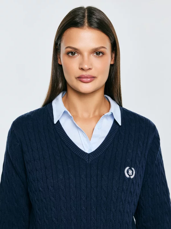 Sweter damski ze splotem warkoczowym z dekoltem v-neck granatowy Nisa 403