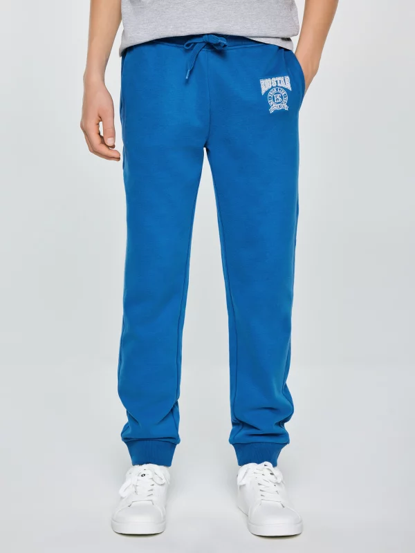 Spodnie chłopięce dresowe niebieskie Lamenp 402