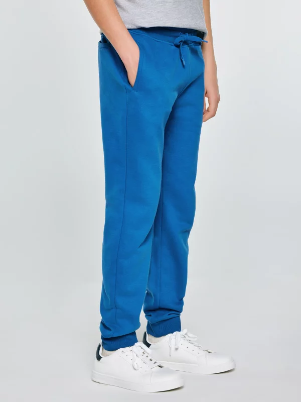 Spodnie chłopięce dresowe niebieskie Lamenp 402