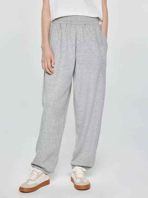 Spodnie dziewczęce dresowe jasnoszare Monara 901