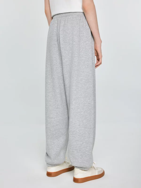 Spodnie dziewczęce dresowe jasnoszare Monara 901