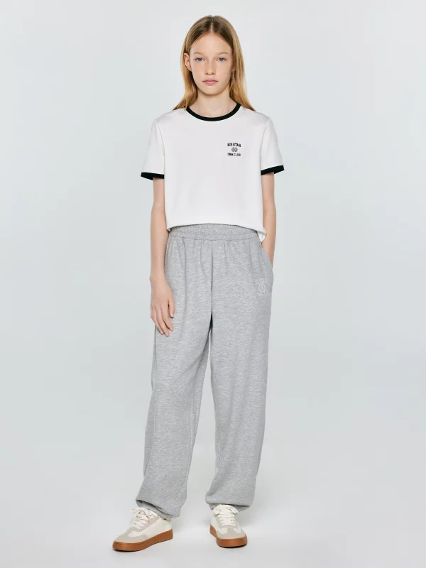 Spodnie dziewczęce dresowe jasnoszare Monara 901