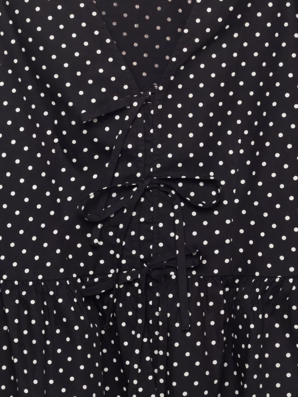 Bluzka damska z baskinką w kropki czarna Sori 906