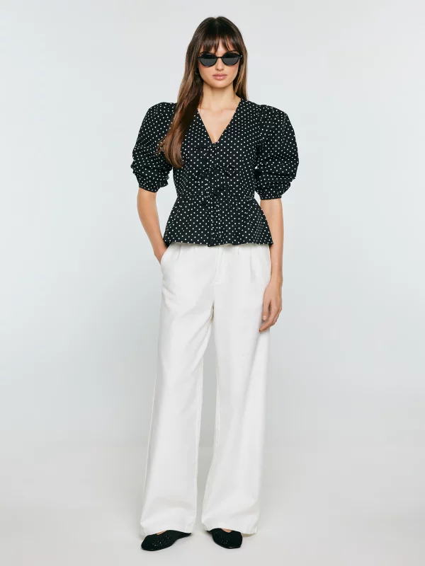 Bluzka damska z baskinką w kropki czarna Sori 906