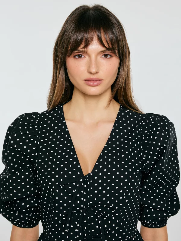 Bluzka damska z baskinką w kropki czarna Sori 906