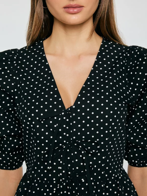 Bluzka damska z baskinką w kropki czarna Sori 906